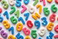 Colorful number toys scattered on white background math learning Royalty Free Stock Photo