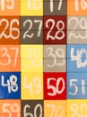 Colorful numbers background Shot black point beetwen yellow grey and red blocks Royalty Free Stock Photo
