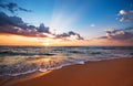 Colorful ocean beach sunrise.