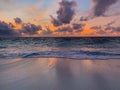 Colorful ocean beach sunset, soft waves. Inspirational sea view and horizon under colorful sky and clouds Royalty Free Stock Photo