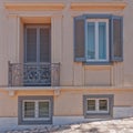 Colorful ocher and gray house exterior, Plaka old neighborhood near Acropolis, Athens Greece Royalty Free Stock Photo
