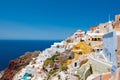 Colorful Oia and detail of the port Ammoudi below on the island of Thira (Santorini), Greece. Royalty Free Stock Photo