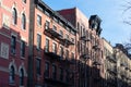 Colorful Old Buildings in Chelsea New York with Fire Escapes Royalty Free Stock Photo