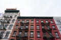 Colorful Old Buildings on the Lower East Side of New York City with Fire Escapes Royalty Free Stock Photo