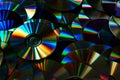 Colorful old CD DVD optical disk storage medium with dust. Dark image Royalty Free Stock Photo