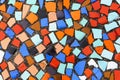 Colorful old crumbling ceramic mosaic tiles. Abstract texture