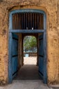 Colorful old doorway from the former prison on Prison Island (Changuu Island) Zanzibar Tanzania Africa