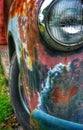 Showing signs of rust numerous paint jobs, this colorful truck front end is still beautiful. Royalty Free Stock Photo