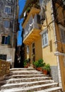 Colorful old house in narrow street in Kerkyra city, Corfu island, Greece Royalty Free Stock Photo