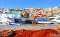 The colorful old houses with windows in city of Sciacca overlooking its harbour. Province of Agrigento, Sicily.