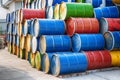 Colorful old industrial metal barrels stacked Royalty Free Stock Photo
