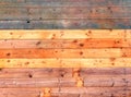 colorful old rustic wooden plank wall or floor with some of the boards stained blue made of reused timber Royalty Free Stock Photo