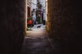 Colorful Old Town street perspective view in Trogir, Dalmatia, Croatia. Kitten in the stone street of Trogir. Royalty Free Stock Photo