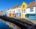 Colorful old townhouses reflect in the Somme river in Amiens, France Royalty Free Stock Photo