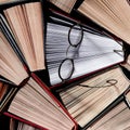 Colorful open books goy to reading stand on the shelf of the home library