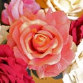 Colorful orange fake rose flower top view Royalty Free Stock Photo