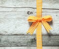 Colorful orange and white festive rustic bow