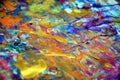 Colorful orange yellow purple gold paint blurred splashes, colorful vivid waxy colors, contrasts creative background Royalty Free Stock Photo