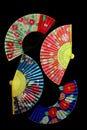 Colorful oriental printed paper fans background 