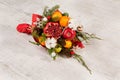 Colorful original bouquet of fruits and flowers.