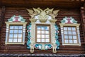 Colorful ornate window of the reconstructed version of the Great Wooden Palace at the Kolomenskoe museum-reserve in Moscow