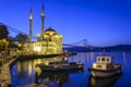 Colorful Ortakoy mosque and Bosphorus Bridge reflection on the sea Royalty Free Stock Photo