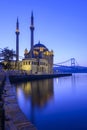 Colorful Ortakoy mosque and Bosphorus Bridge reflection on the sea Royalty Free Stock Photo