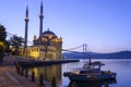 Colorful Ortakoy mosque and Bosphorus Bridge reflection on the sea Royalty Free Stock Photo