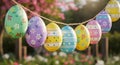 Colorful oval-shaped Easter eggs hanging on a string as a decoration Royalty Free Stock Photo