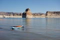 A colorful paddle board ready to be used at Lake Powell in the summertime