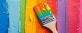 Colorful Paintbrush on Rainbow Paint Strokes. Home Renovation and DIY Projects