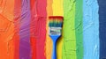 Colorful Paintbrush on Rainbow Paint Strokes. Home Renovation and DIY Projects