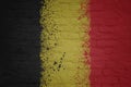 colorful painted big national flag of belgium on a massive brick wall Royalty Free Stock Photo