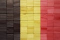 colorful painted big national flag of belgium on a wooden cubes texture Royalty Free Stock Photo