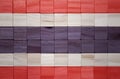 colorful painted big national flag of thailand on a wooden cubes texture Royalty Free Stock Photo