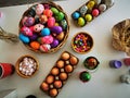 The colorful painted Easter eggs in the basket in the studio false allegation