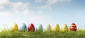 Colorful Painted Easter Eggs Lined Up on Grass