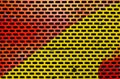 Colorful painted metal sheet perforated Royalty Free Stock Photo