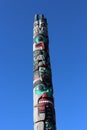 A colorful painted totem pole at Peace Arch Park Royalty Free Stock Photo