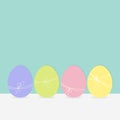 Colorful painting Easter egg set. Row of painted eggs shell with thread and bow. Light color. Blue background. Isolated. Flat