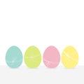 Colorful painting Easter egg set. Row of painted eggs shell with thread and bow. Light color. White background. Isolated.