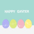 Colorful painting egg set. Row of painted eggs shell with thread and bow. Light color. Blue background. Isolated. Happy Easter