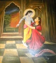 Bangalore, India - January 1, 2009 Colorful painting of Lord Krishna with mother Yashoda