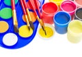 Colorful paints and brushes Royalty Free Stock Photo