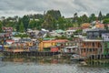 Colorful palafitos, traditional wooden stilt houses in Castro on the island Chiloe. Royalty Free Stock Photo