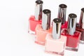 A colorful palette of nail polish bottles on a white background Royalty Free Stock Photo
