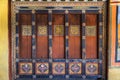 Traditional colorful panels and window of Trongsa Dzong , carving and painting , art of Bhutan Royalty Free Stock Photo