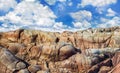 Colorful panoramic rocky seashore with little house