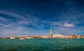 Colorful panoramic view of Doge Palace, Campanile and San Marco square from busy Grand Canal water during sunset, Venice, Italy, Royalty Free Stock Photo