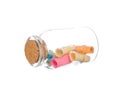 Colorful paper in the bottle with cork isolated on white Royalty Free Stock Photo